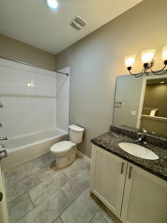 Building Photo - Move in ready 3/2 New Construction Townhou...
