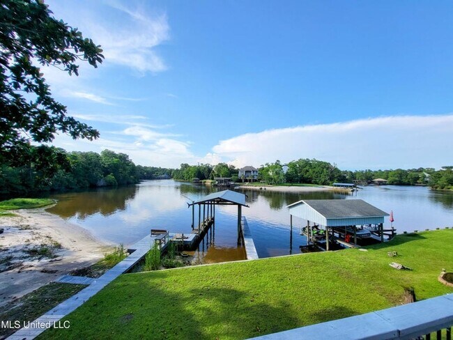 Building Photo - Riverfront Living with Private Boat Launch