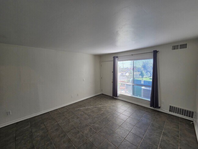 Building Photo - 15301 Santa Gertrudes Ave