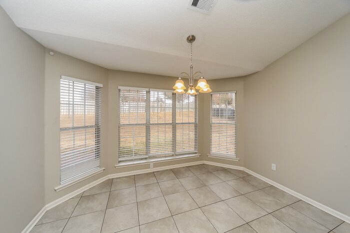 Building Photo - 9939 Greenalder Cove N