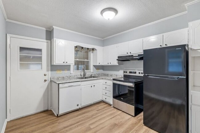 Building Photo - McLeansville - Minutes from Elon & Greensboro! Few Acres, Brick Duplex, Just Painted, New Carpet,...