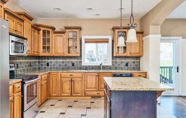Building Photo - Jumbo-Sized 2-Story on Huge Corner Lot, Play Gym, 3-Car Garage, Bonus Room-Office, Pets OK!