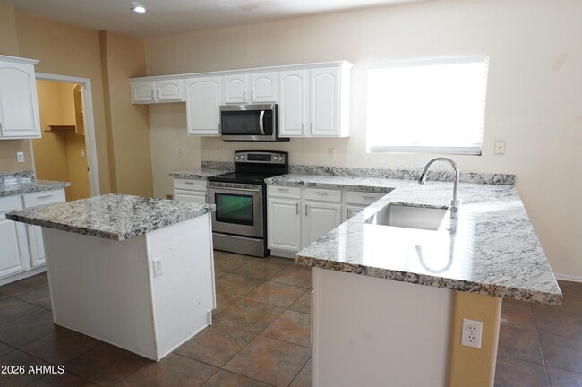 Building Photo - 9465 E Lompoc Ave