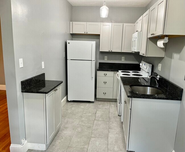 generous cabinets, counters - 52 Strathmore Rd