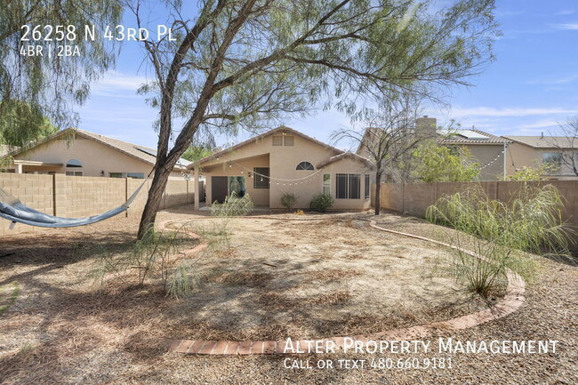 Building Photo - NEWER QUARTZ 4BR 2B