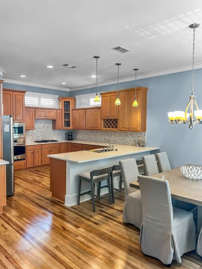 Building Photo - 50% off first months rent.  Remodeled 5 bedroom house with bikes – walking distance to the beach