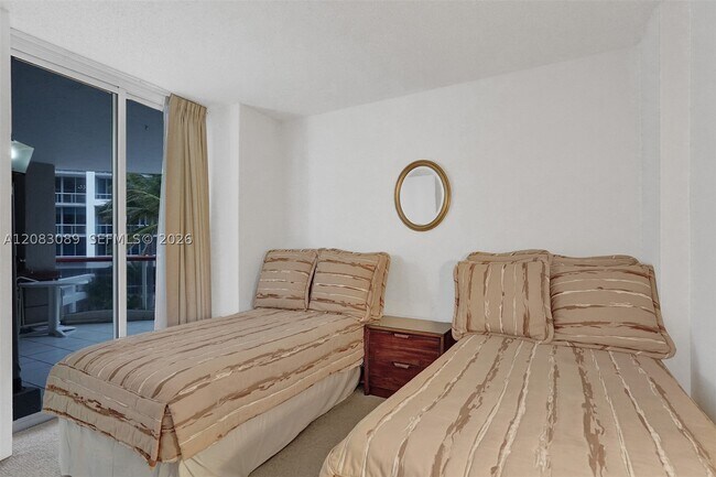 Building Photo - 6767 Collins Ave