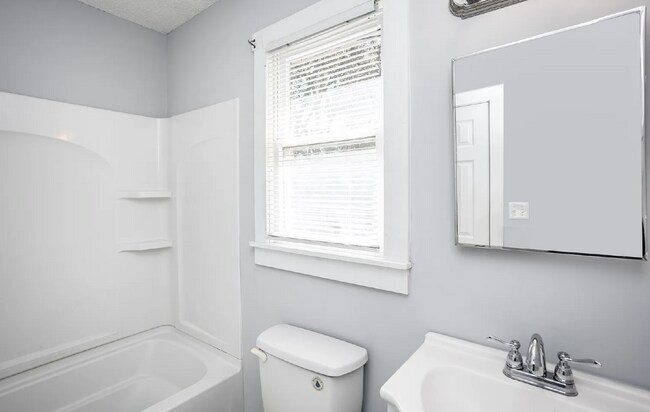 Building Photo - " 2-Bed Duplex on Large Lot- Off Street Parking"