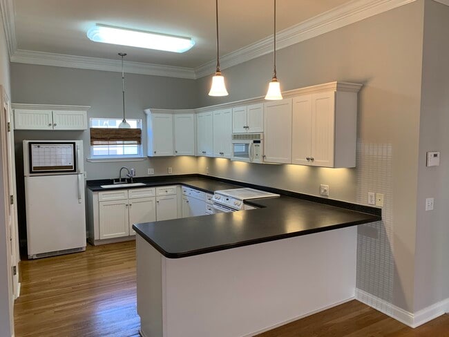 Building Photo - 4565 Woodwind Dr