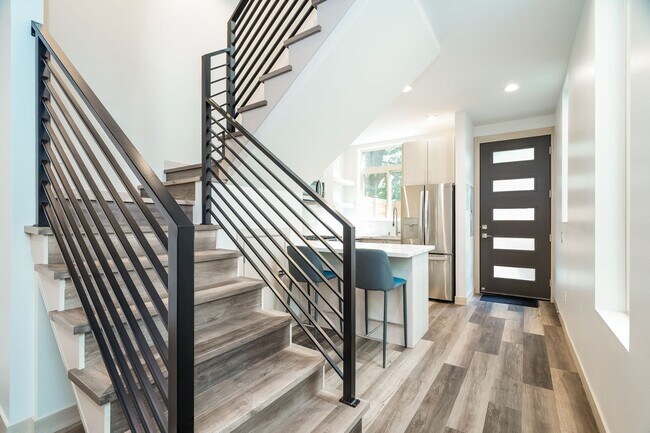 Building Photo - Stylish 3 Bedroom with Rooftop Decks and Dedicated Parking