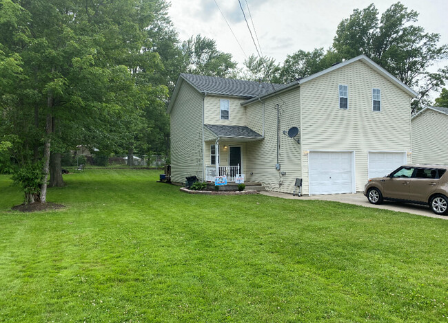 Building Photo - 5046 Clifton Ave (Left)