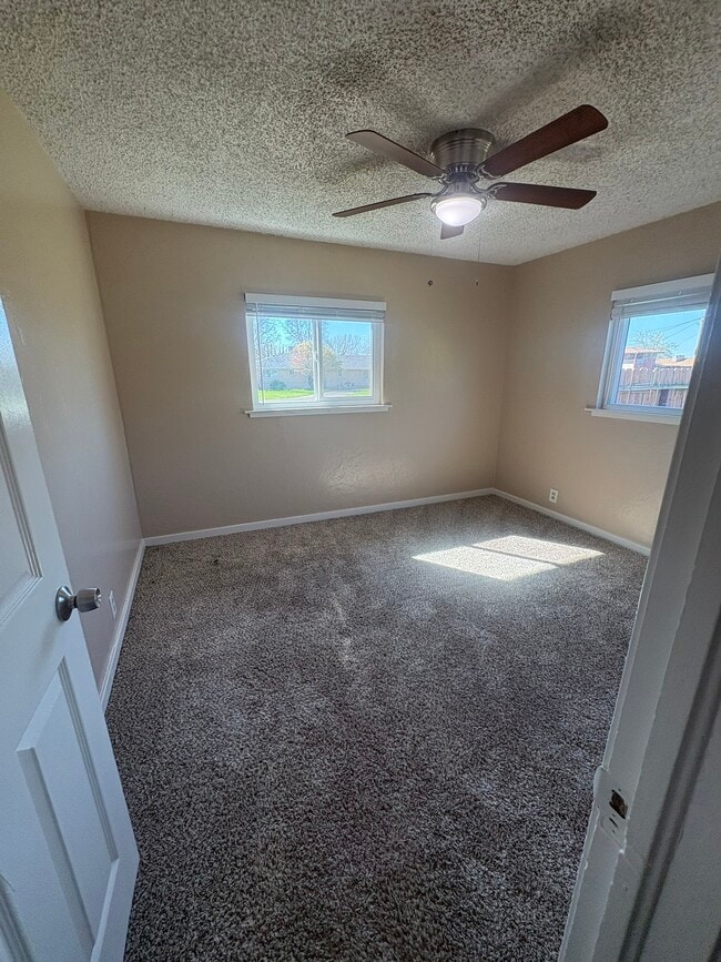 Building Photo - 6832 E Harvey Ave