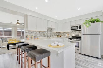 Building Photo - Palm View Village (Furnished Units Available)