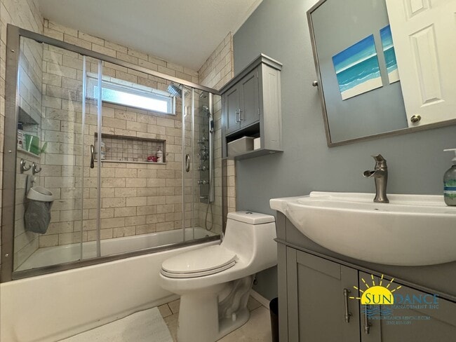 Building Photo - 4-Bedroom Home with Stunning Features, Private Oasis, and Beach Access!