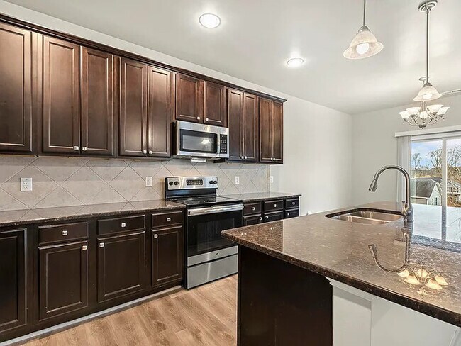 Building Photo - Earn Wealth While Leasing - Like a Homeown...