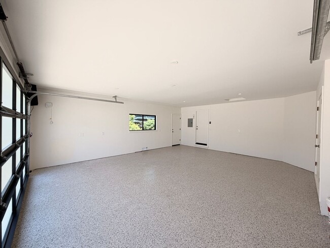 Building Photo - This premier 4-bed, 3-bath estate spans 2,565 sq. ft. on a 10,253 sq. ft. lot in North Los Altos.