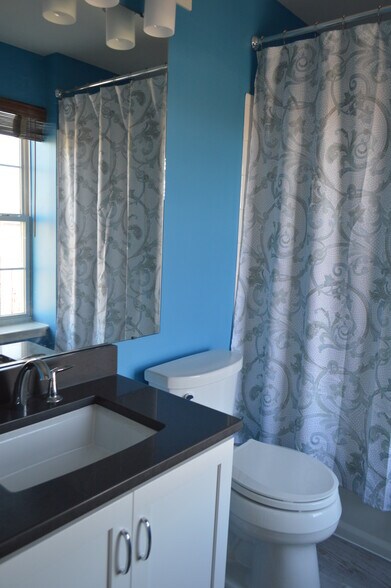 Newly remodeled bathroom off 1st bedroom. - 1405 Roundhouse Lane