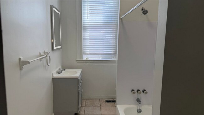 Building Photo - 1 Plus Den Condo