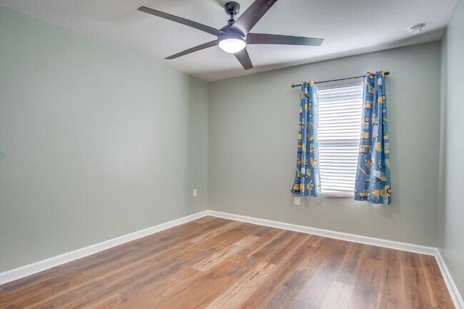 Building Photo - Move In for the Holidays! Heated Saltwater Pool & Tropical Backyard –$500 OFF First Month + Milit...