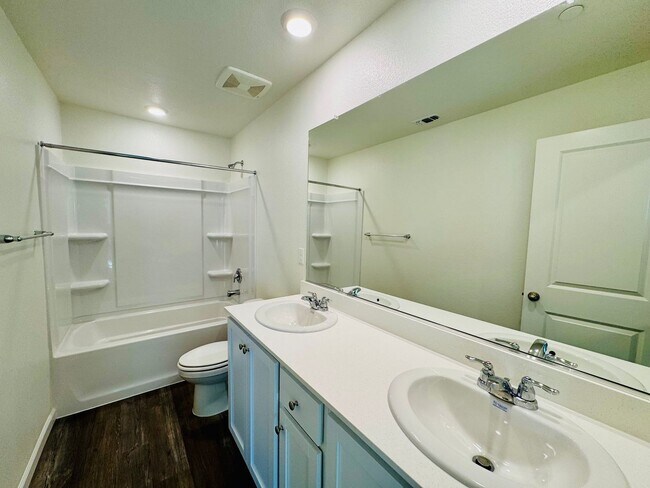 Building Photo - REDUCED!  BRAND NEW - 5 Bedroom + Loft, 3 ...