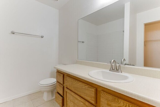 Building Photo - Charming 2 Bed, 2 Bath Condo with Fireplace & Balcony! 89011