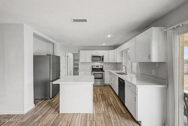Building Photo - 5439 W Becker Ln