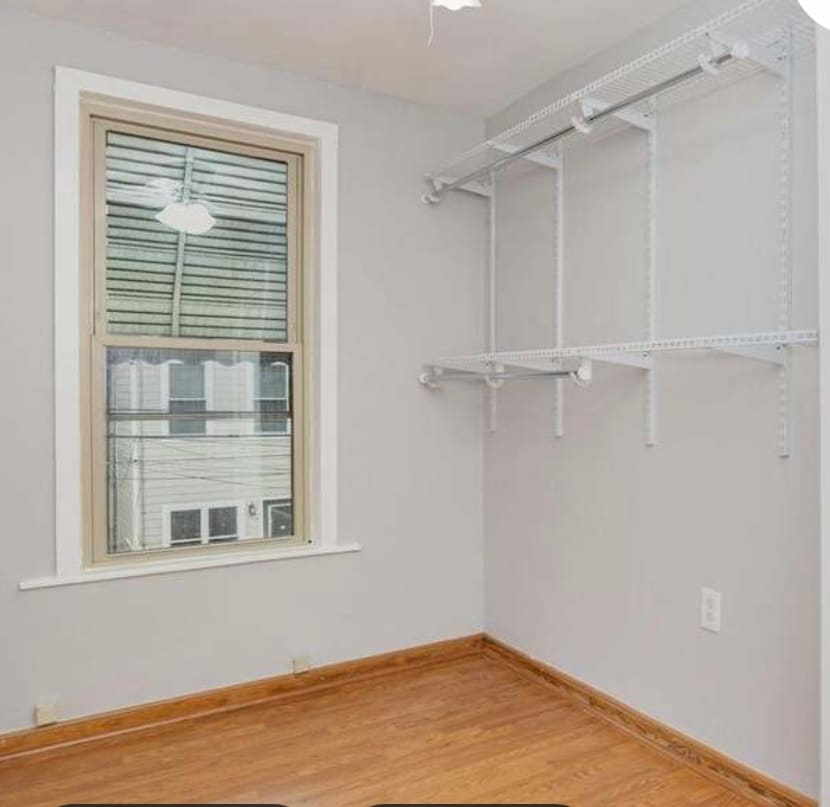 2nd small BR - shelves installed for walk in closet - 1011 S Robinson St