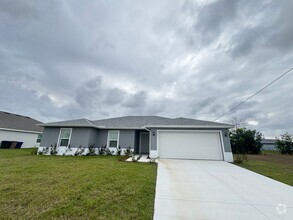 Building Photo - Brand New 4BR/2BA Home in Cape Coral – Law...