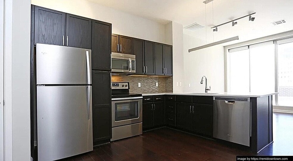 Building Photo - 411 N Akard St