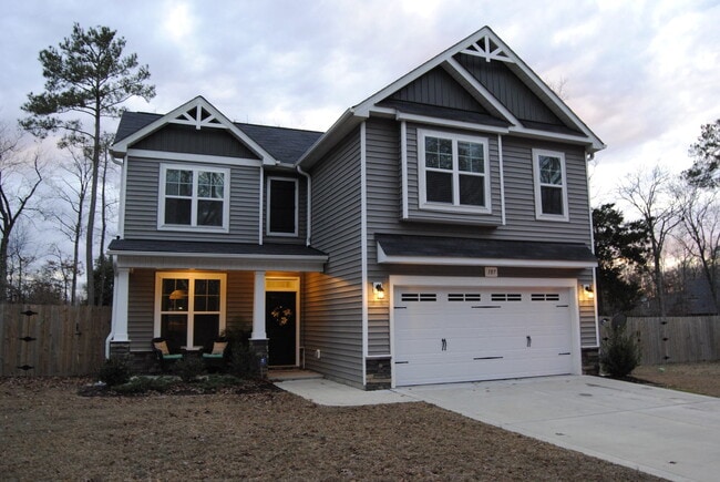 Building Photo - Spacious 4-Bedroom Home with Loft, New Car...