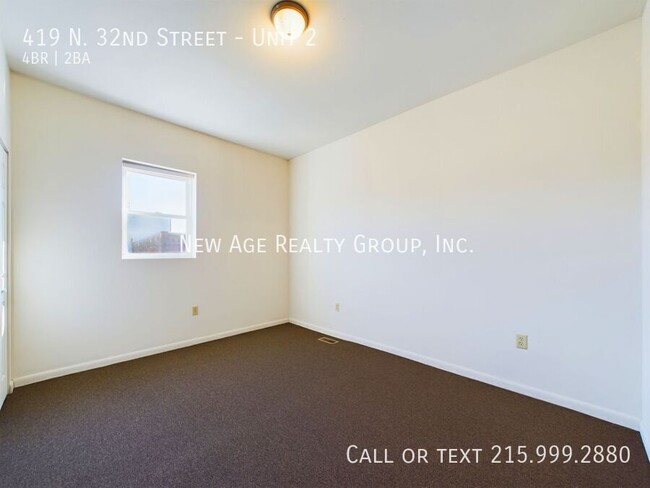 Building Photo - Spacious, Bi-level Apartment Available at ...
