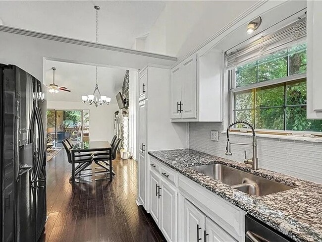 Building Photo - Newly Updated 3 Bed/2 Bath Duplex in Blue Valley with Fenced Yard, Large Deck & Attached 2-Car Ga...