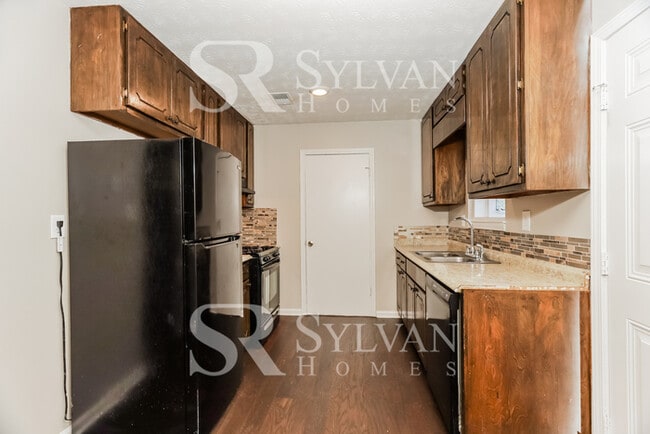 Building Photo - Turn the key. Enter. Smile. Repeat every day!