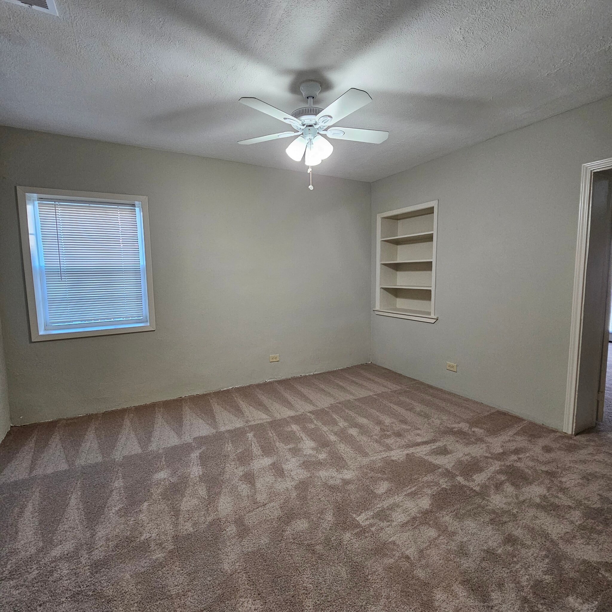 Bedroom 1 w/Built in Bookshelf - 10128 Kilarney Dr