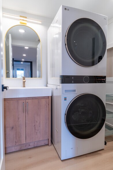 Washer and Dryer with extra sink for your convenience - 1519 32nd Ave