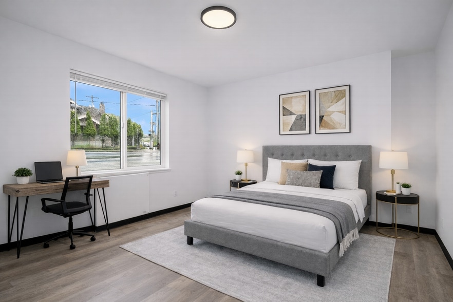 Furnished Bedroom with Queen Bed (Furnishings may vary) - 5004 7th Ave NE