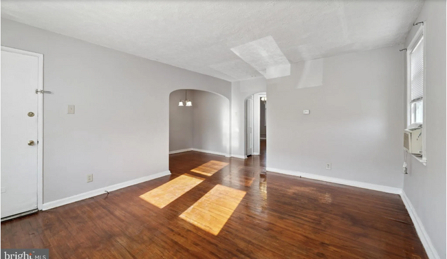 Open living to dining area - 339 E Essex Ave