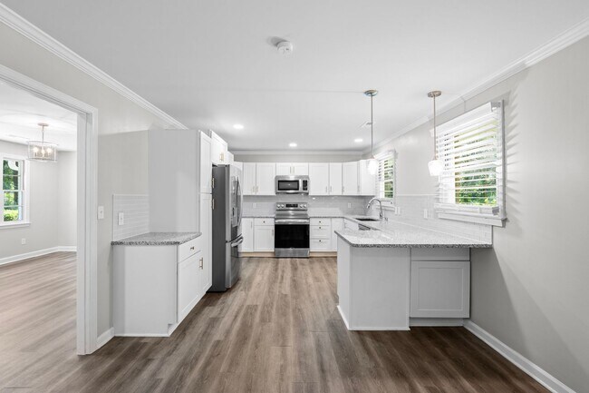 Building Photo - Charming, Newly Remodeled 3 BR, 1.5 BA Home with Fenced Yard on Large Private Lot
