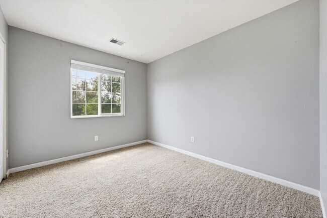 Building Photo - Spacious 4-Bedroom Townhome Backing to Open Space – Attached 2-Car Garage!
