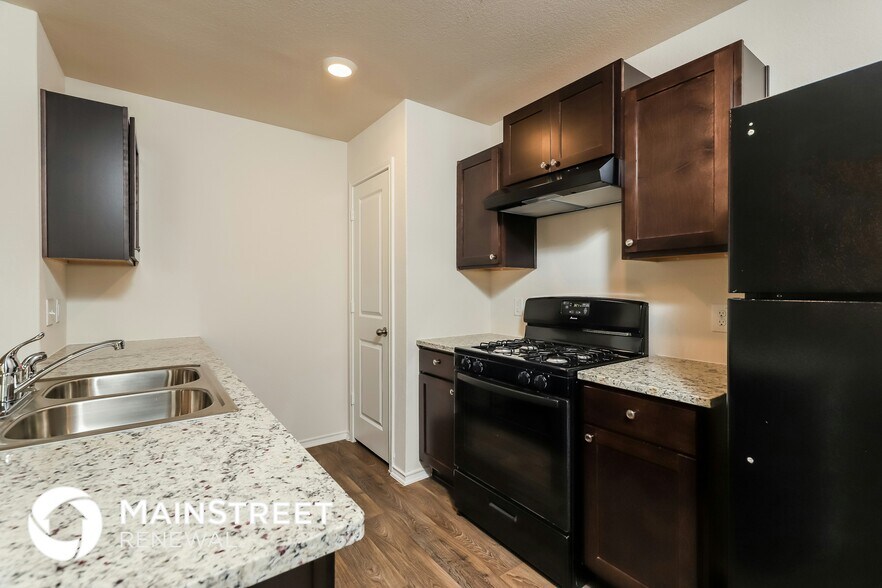 Building Photo - 6614 Legato Curv