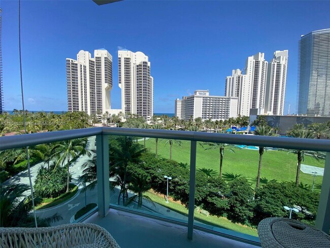 Building Photo - 19370 Collins Ave