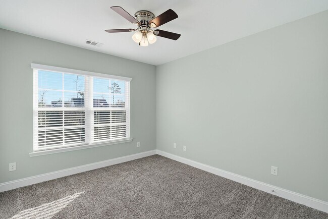 Building Photo - Charming 3 Bedroom Townhome with Private Patio & Fenced Backyard