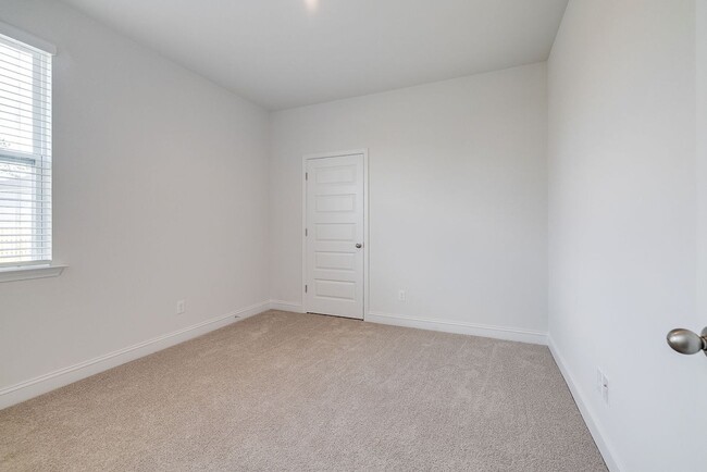 Building Photo - Beautiful 4BR Home in Woodland Trail – Top...