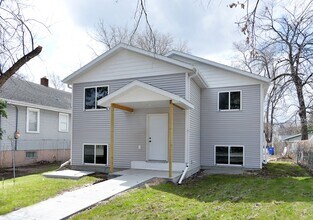 Building Photo - Spacious 4 Bed, 2 Bath Single-Family NEW B...