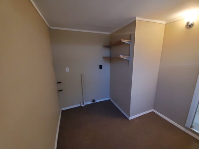 Building Photo - Two Bedroom House with carport