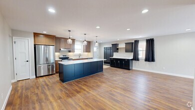 Building Photo - New 2 bed/2bath/2 car garage Duplex~Westby
