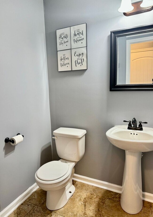 Building Photo - Large Open 4 Bedroom Home with Bonus! Tree Lined Backyard with Privacy Fence!