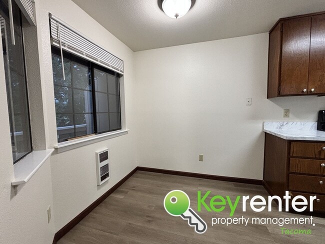 Building Photo - Comfortable Upstairs 2 Bedroom 2 Bath Rental in Private Community Near Fircrest!