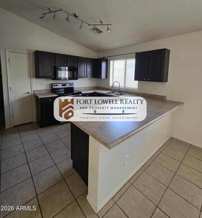 Building Photo - 23952 W Desert Bloom St