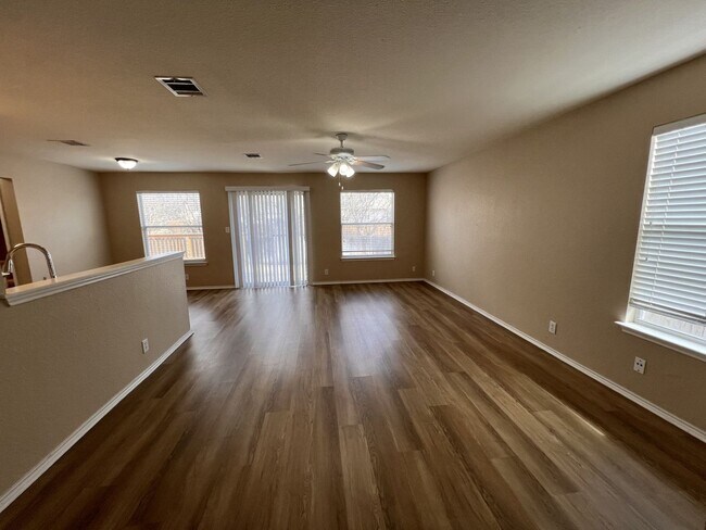 Building Photo - Generous Outdoor Space & Lawn Care Included!